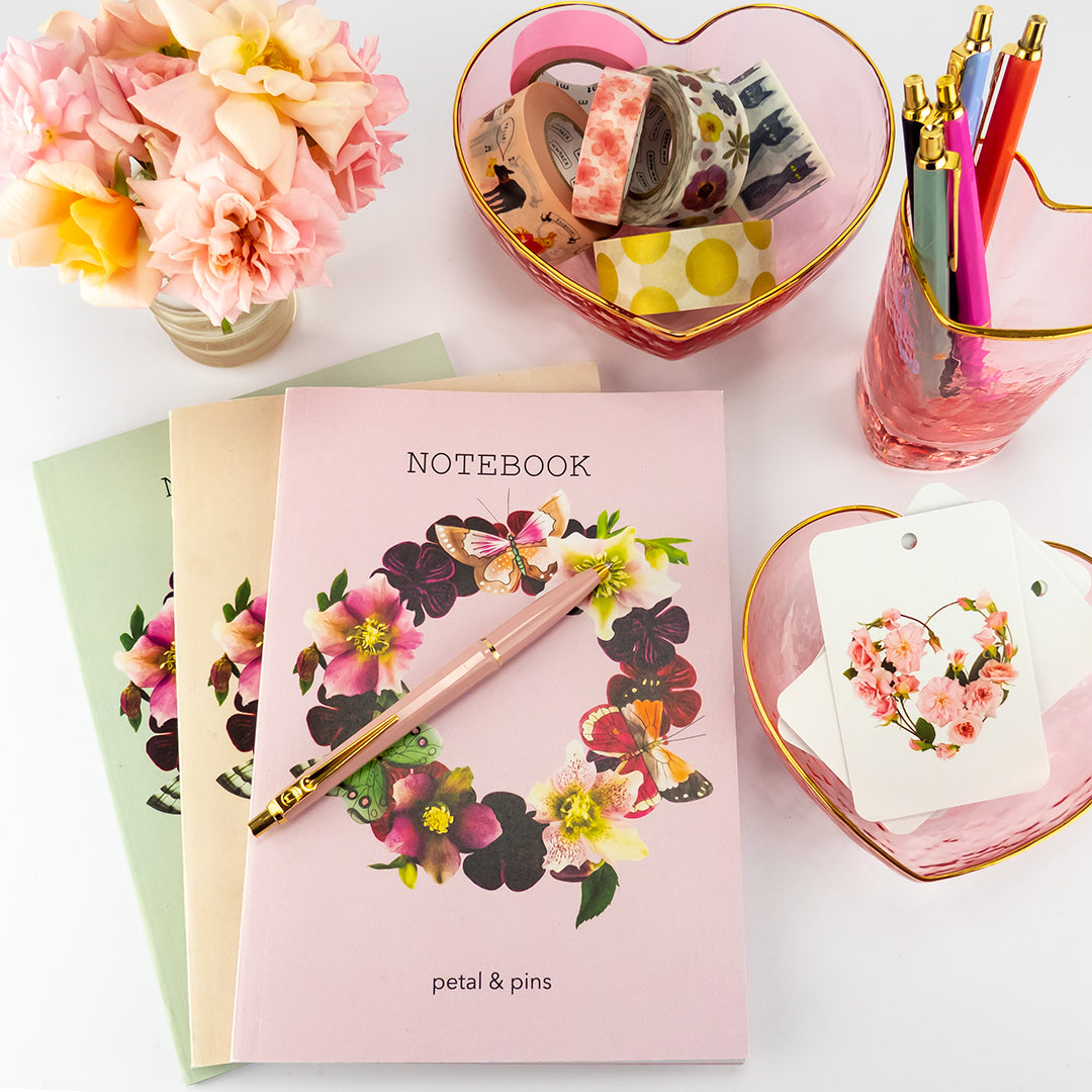 butterfly garland notebooks and love letters gift tags by petal & pins styled with ballograf epoca luxe pens, mt washi tape, pink glass heart bowls from The Source and fresh cećile brünner roses from the petal & pins garden
