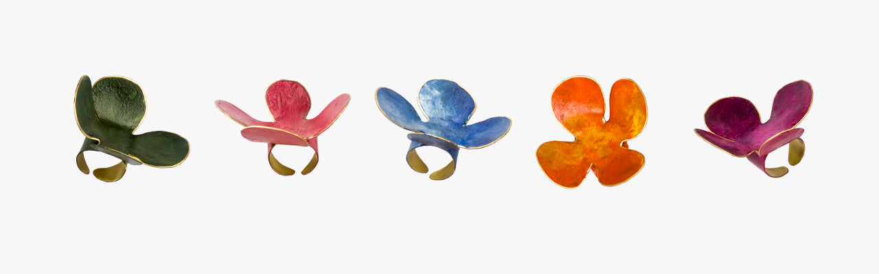 assortment of handmade 'blume' flower rings by Dora Haralambaki
