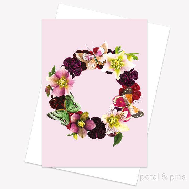 Butterfly Garland (Rosewater) card by petal & pins. Greeting card with floral and butterfly design on a pink background.