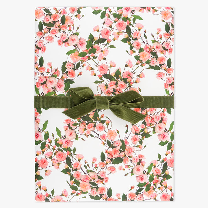 rose lattice wrapping paper by petal & pins styled tied with a green bow