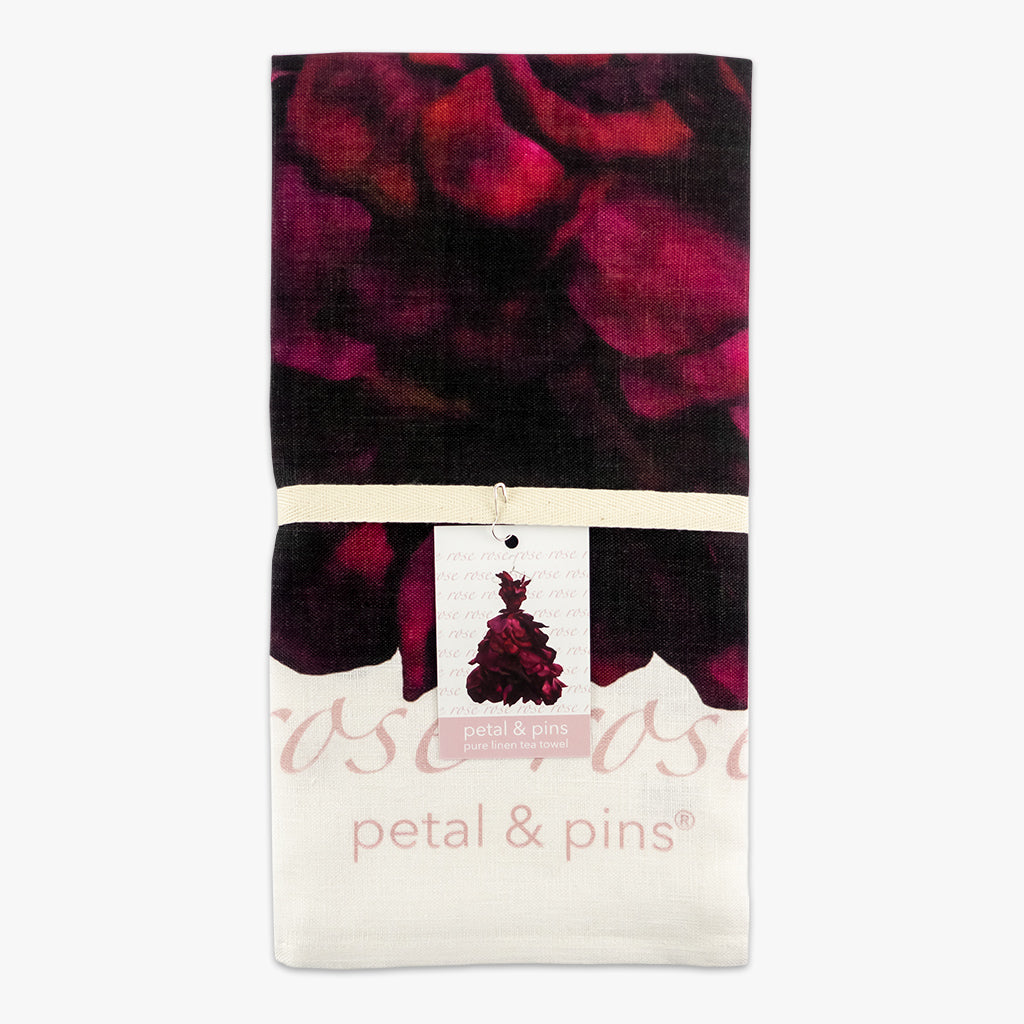 red wine rose gown tea towel by petal & pins - folded